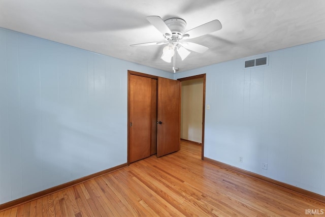 2730 Newman Rd, West Lafayette, IN 47906 - unfurnished bedroom with light wood-type flooring, baseboards, a closet, and a ceiling fan