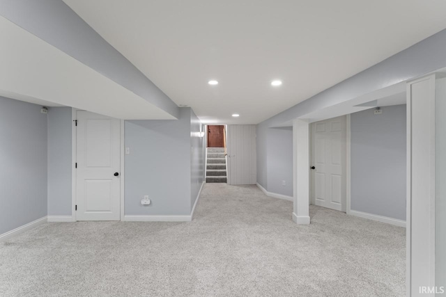 2730 Newman Rd, West Lafayette, IN 47906 - finished below grade area with carpet, baseboards, recessed lighting, and stairway