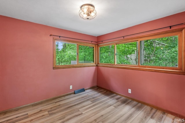 2730 Newman Rd, West Lafayette, IN 47906 - unfurnished room with light wood-style floors and baseboards