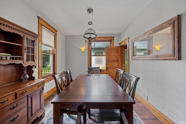 1824 Maple St, Lafayette, IN 47904 - dining room with dark wood-style flooring and baseboards