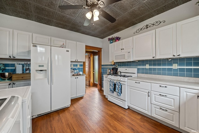 1824 Maple St, Lafayette, IN 47904 - kitchen featuring white appliances, an ornate ceiling, light wood-type flooring, white cabinetry, and light countertops