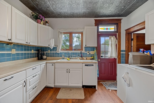 1824 Maple St, Lafayette, IN 47904 - kitchen with a sink, dishwasher, an ornate ceiling, independent washer and dryer, and wood finished floors