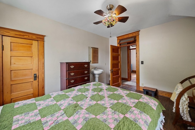 1824 Maple St, Lafayette, IN 47904 - bedroom featuring wood finished floors, baseboards, and a ceiling fan