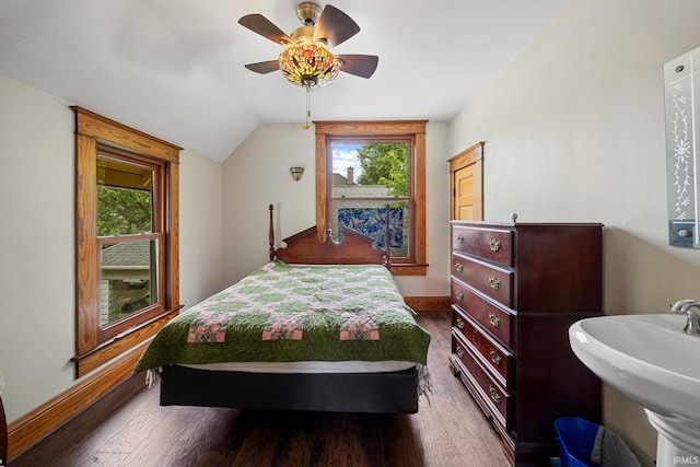1824 Maple St, Lafayette, IN 47904 - bedroom featuring multiple windows, wood finished floors, lofted ceiling, baseboards, and ceiling fan