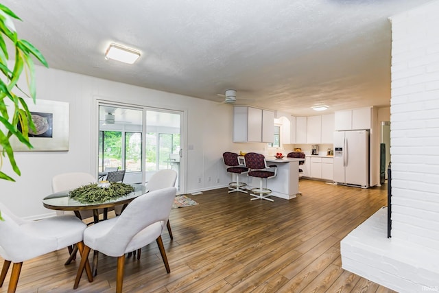 6607 W Ryan Dr, Anderson, IN 46011 - dining room featuring wood finished floors and baseboards