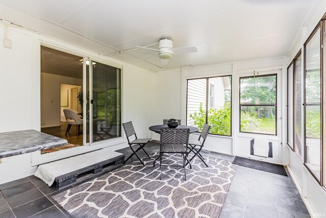 6607 W Ryan Dr, Anderson, IN 46011 - sunroom featuring a ceiling fan and tile patterned floors