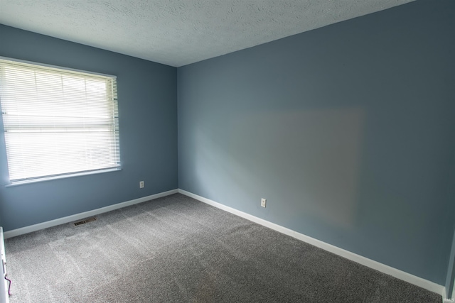 1708 Mason Dixon Dr, West Lafayette, IN 47906 - carpeted spare room with a textured ceiling and baseboards