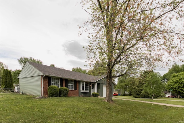 1708 Mason Dixon Dr, West Lafayette, IN 47906 - ranch-style home featuring an attached garage, brick siding, and a front yard