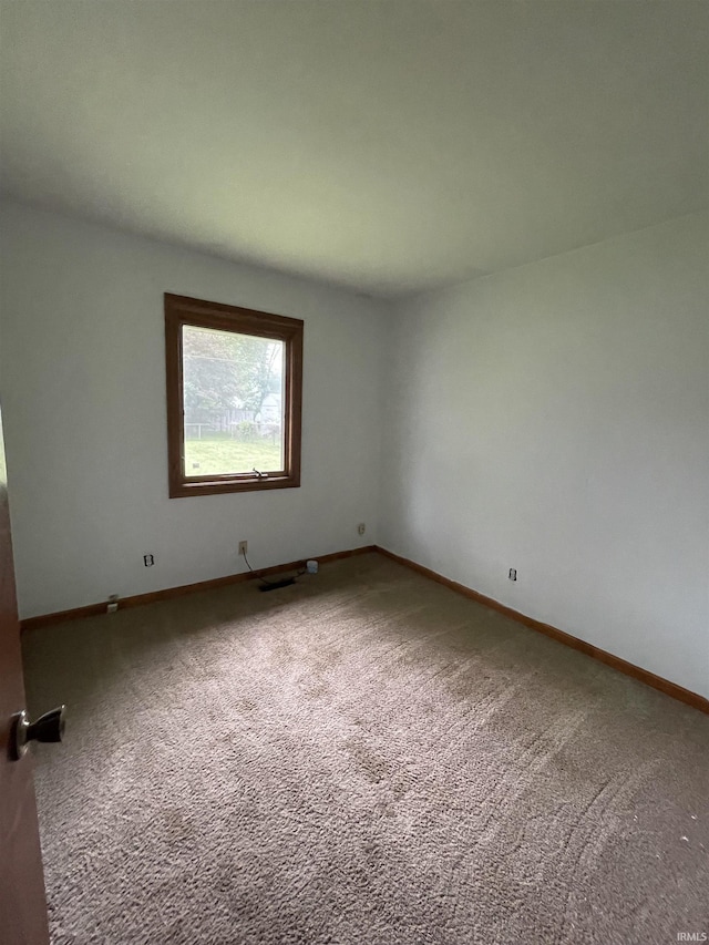2724 Elva Dr, Kokomo, IN 46902 - carpeted empty room featuring baseboards