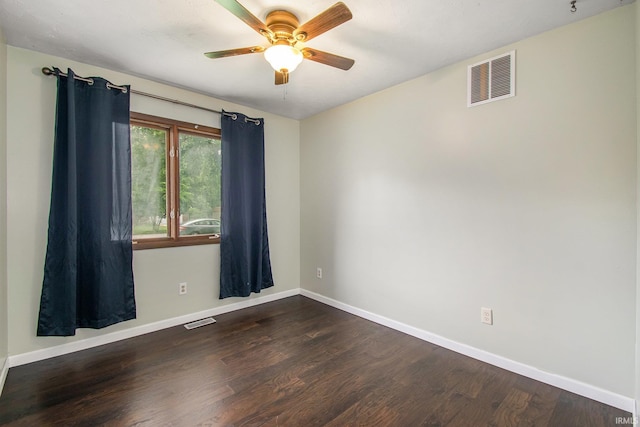 1453 Brookview Ave, Warsaw, IN 46580 - empty room with baseboards, dark wood-type flooring, and a ceiling fan