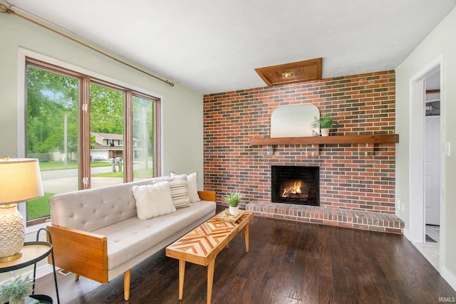 1453 Brookview Ave, Warsaw, IN 46580 - living area with wood finished floors and a brick fireplace