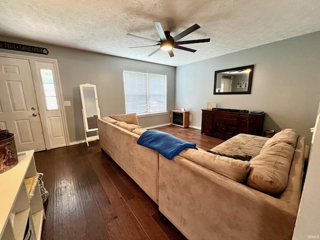 348 N Dover Clfs, Ellettsville, IN 47429 - living room with ceiling fan, a textured ceiling, dark wood finished floors, and baseboards