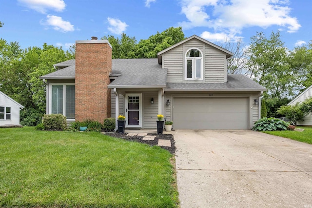 2218 Wake Robin Dr, West Lafayette, IN 47906 - traditional-style house featuring roof with shingles, an attached garage, a front lawn, a chimney, and driveway