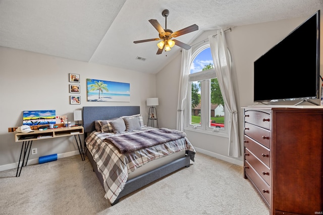 2218 Wake Robin Dr, West Lafayette, IN 47906 - bedroom featuring vaulted ceiling, light colored carpet, baseboards, a ceiling fan, and a textured ceiling