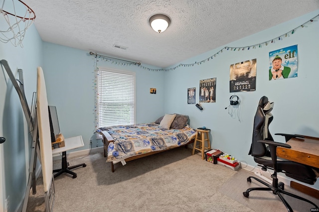 2218 Wake Robin Dr, West Lafayette, IN 47906 - carpeted bedroom with a textured ceiling, a desk, and baseboards