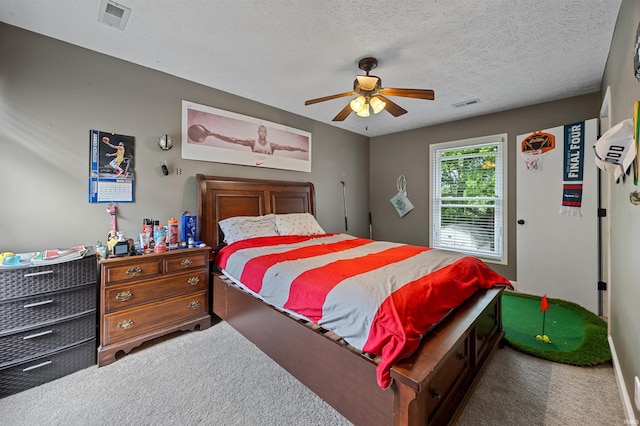 2218 Wake Robin Dr, West Lafayette, IN 47906 - bedroom featuring carpet floors, ceiling fan, and a textured ceiling