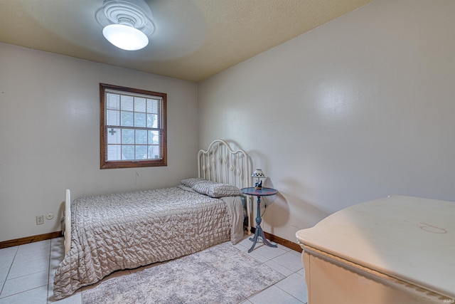 907 Nicholas Dr, Boonville, IN 47601 - bedroom with light tile patterned floors and baseboards
