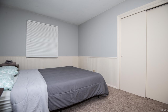 1416 State St, Vincennes, IN 47591 - carpeted bedroom featuring a wainscoted wall and a closet
