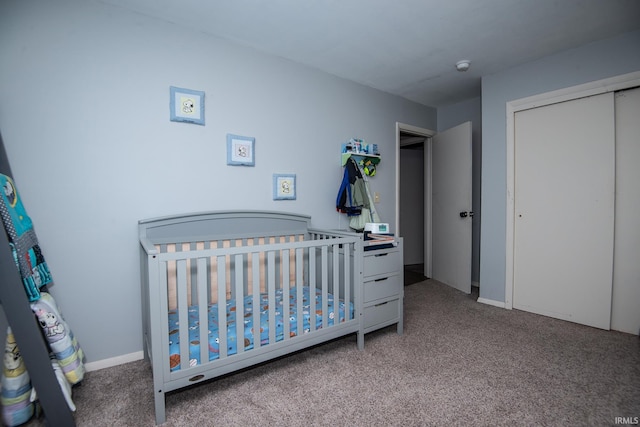 1416 State St, Vincennes, IN 47591 - bedroom featuring carpet floors, a closet, and a nursery area