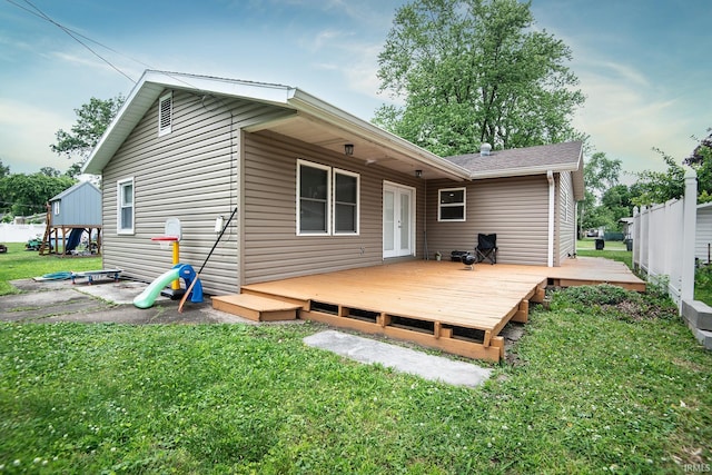 1416 State St, Vincennes, IN 47591 - back of property with a yard and a deck