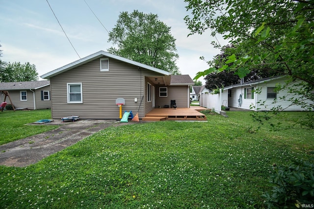 1416 State St, Vincennes, IN 47591 - rear view of house with a wooden deck and a yard