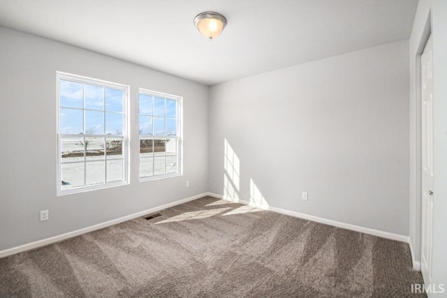 8247 Catberry Trl, Fort Wayne, IN 46804 - carpeted spare room featuring baseboards
