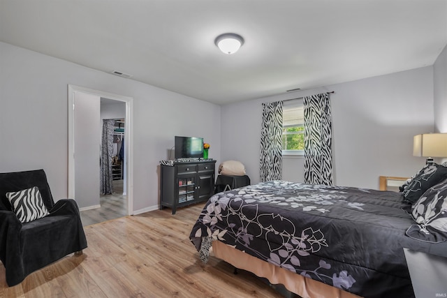 1591 W 100 N, Hartford City, IN 47348 - bedroom featuring wood finished floors and baseboards