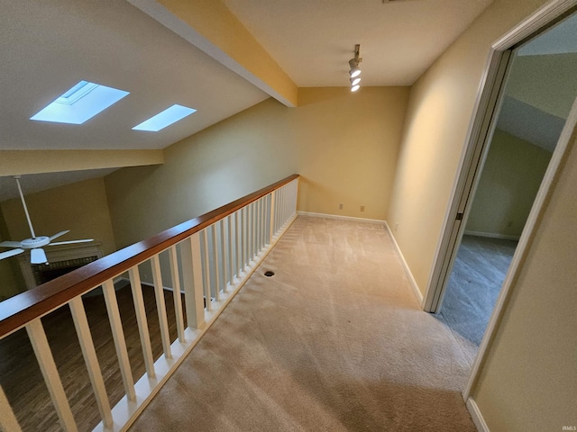1327 Timberlake Rd, Evansville, IN 47710 - hallway with a skylight, carpet, and baseboards