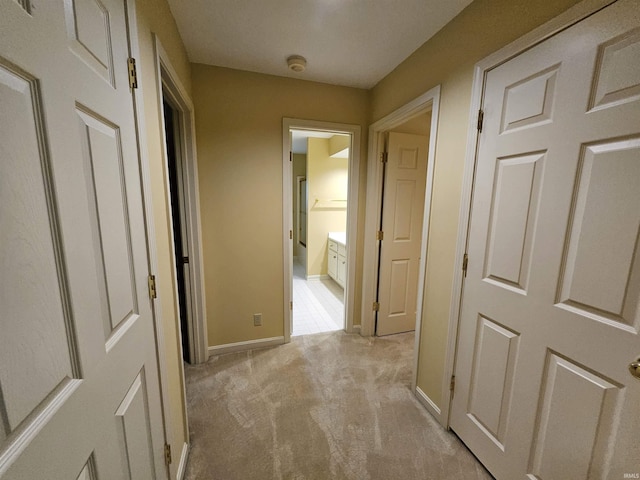 1327 Timberlake Rd, Evansville, IN 47710 - corridor featuring light colored carpet and baseboards