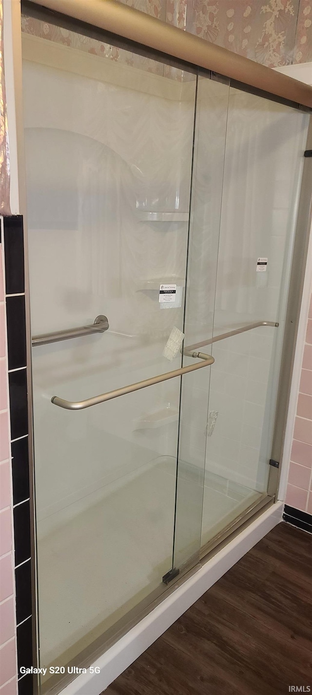 1202 N Sheridan Rd, Marion, IN 46952 - bathroom with wood finished floors and a shower stall