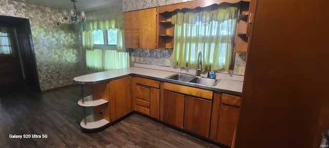 1202 N Sheridan Rd, Marion, IN 46952 - kitchen with a sink, wallpapered walls, brown cabinets, open shelves, and dark wood finished floors