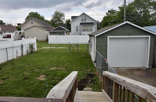 344 W 4th St, Jasper, IN 47546 - view of yard featuring an outbuilding, a garage, and driveway