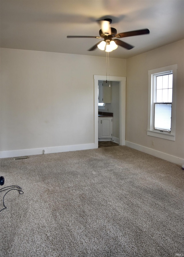 344 W 4th St, Jasper, IN 47546 - carpeted empty room featuring a ceiling fan and baseboards