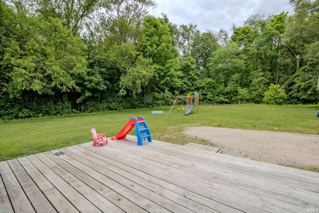 1113 Harrison St, Walkerton, IN 46574 - deck with a playground and a lawn