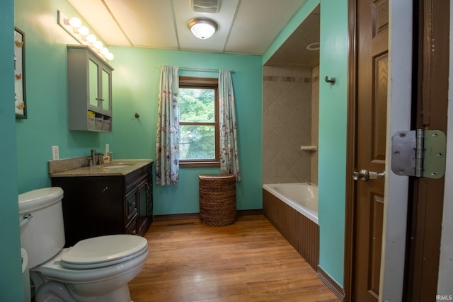 1113 Harrison St, Walkerton, IN 46574 - bathroom featuring toilet, wood finished floors, and vanity