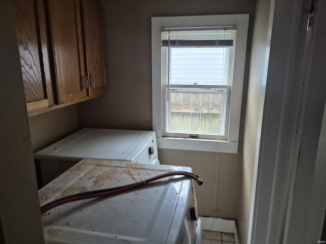 435 N Main St, Mulberry, IN 46058 - laundry room featuring cabinet space, washer / dryer, and baseboards