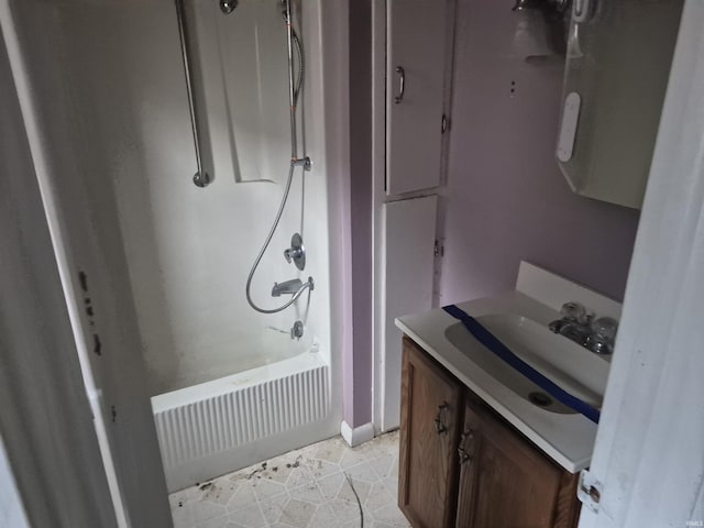 435 N Main St, Mulberry, IN 46058 - bathroom featuring vanity, bathtub / shower combination, and baseboards