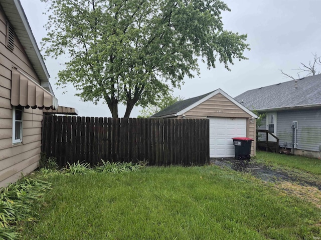 435 N Main St, Mulberry, IN 46058 - view of yard with a garage, an outbuilding, and driveway