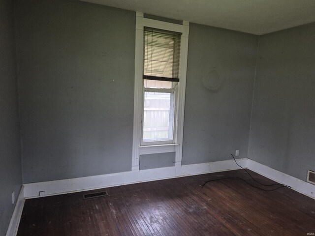 435 N Main St, Mulberry, IN 46058 - spare room featuring hardwood / wood-style flooring, baseboards, and healthy amount of natural light
