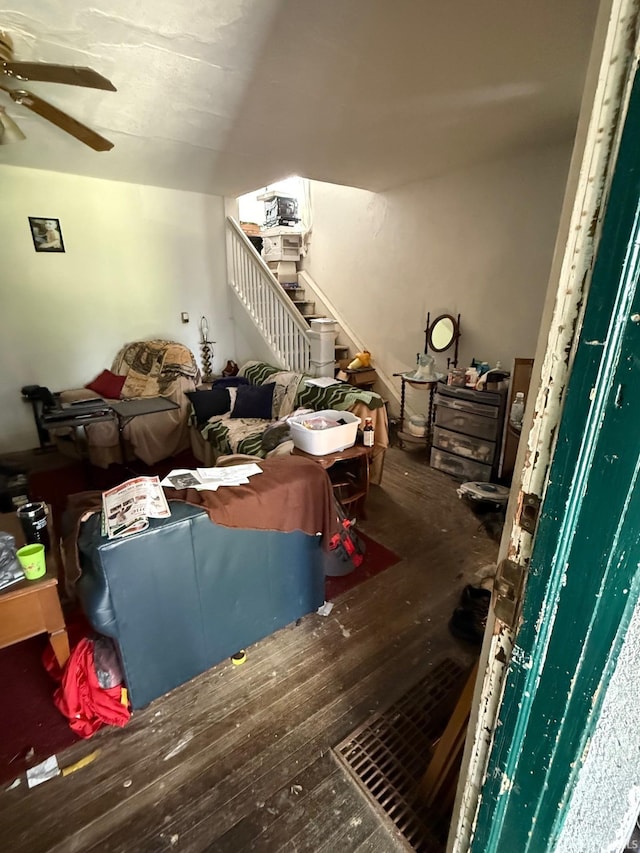 11 Water St, Huntington, IN 46750 - living room with ceiling fan, wood-type flooring, and stairway