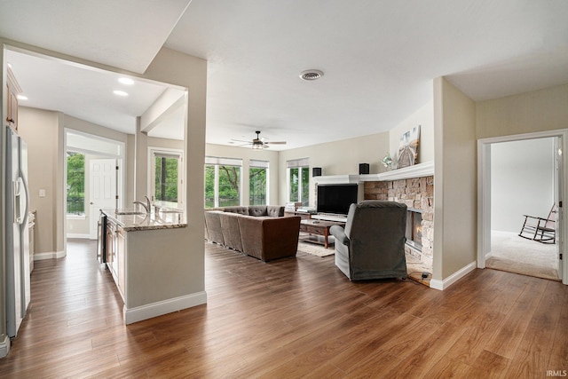 20870 N River Ridge Drive, Bristol, IN 46507 - living room featuring a ceiling fan, plenty of natural light, wood finished floors, and recessed lighting