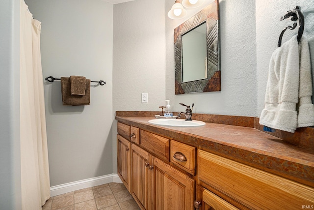 20870 N River Ridge Drive, Bristol, IN 46507 - bathroom featuring vanity, baseboards, and tile patterned flooring
