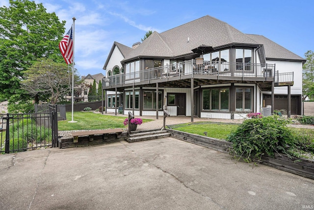 20870 N River Ridge Drive, Bristol, IN 46507 - back of house with a patio, a deck, and roof with shingles