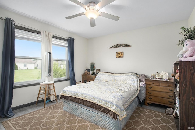 1635 Clover Creek Ln, Goshen, IN 46526 - bedroom with wood finished floors, baseboards, and ceiling fan