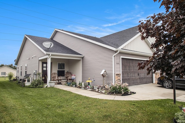 1635 Clover Creek Ln, Goshen, IN 46526 - view of front of property featuring an attached garage, a front yard, a shingled roof, and concrete driveway