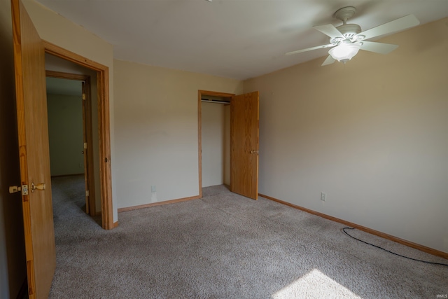 7768 S 100 W, North Judson, IN 46366 - unfurnished bedroom with light carpet, a closet, baseboards, and ceiling fan