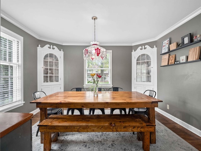 2728 E Dr, Fort Wayne, IN 46805 - dining area with baseboards, plenty of natural light, crown molding, and wood finished floors