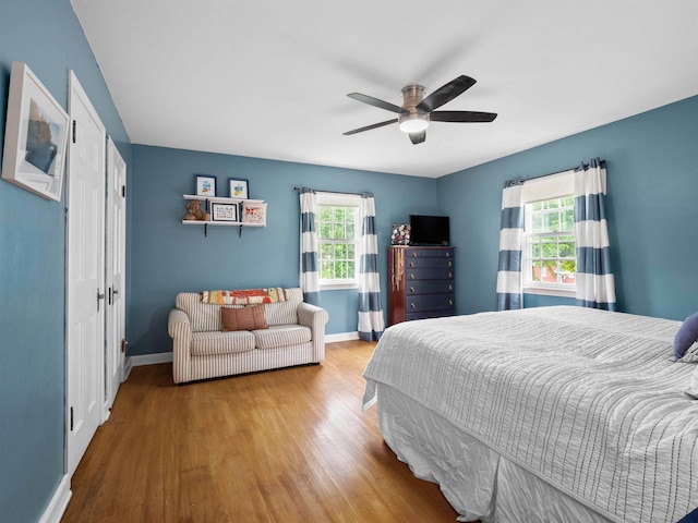 2728 E Dr, Fort Wayne, IN 46805 - bedroom featuring wood finished floors, baseboards, and a ceiling fan