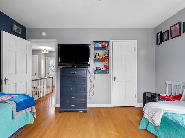 2728 E Dr, Fort Wayne, IN 46805 - bedroom featuring light wood-style flooring and baseboards