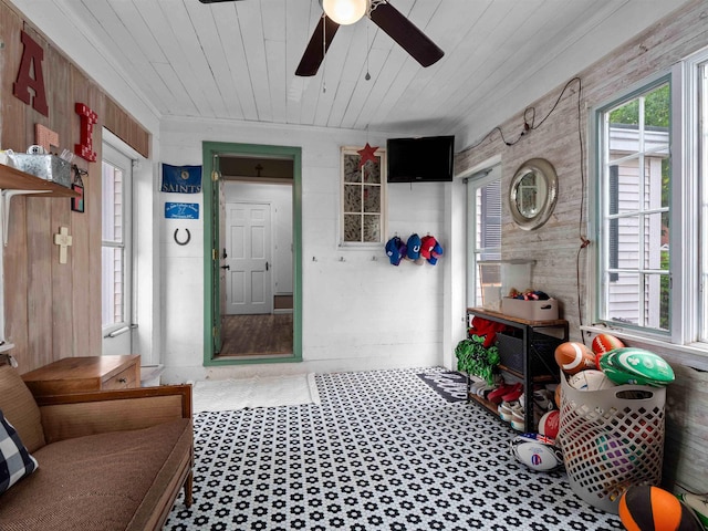 2728 E Dr, Fort Wayne, IN 46805 - mudroom featuring ceiling fan, wooden ceiling, wooden walls, and carpet